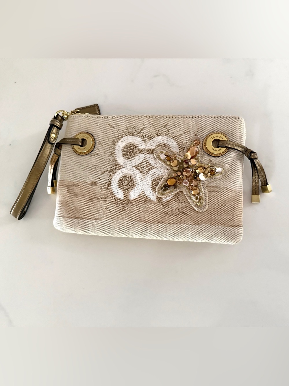 COACH•Audrey rare canvas studded starfish clutch wristlet EUC